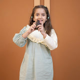 Mamarill Girls A Sweet And Stylish Mint Green Dress With Elegant Cream Detailing.