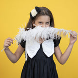 Mamarill Girls Chic Bow Tunic Is A Chic Black Dress With A Distinctive White Bow Accent On The Chest.