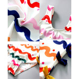 LSB Multi Bows & Waves , Toddlers & Kids Swimwear with matching Swim Cap, plus Free Wash Bag & Free Swim Detergent