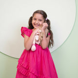 Mamarill Girls Pink Petal Dress Features A Bright Pink Hue Ruffled Sleeves