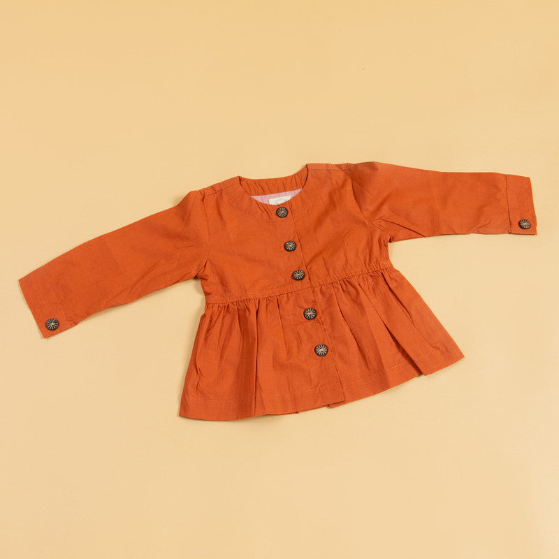 Rust peplum top