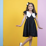 Mamarill Girls Chic Bow Tunic Is A Chic Black Dress With A Distinctive White Bow Accent On The Chest.
