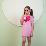 Mamarill Girls Sweetheart Dress Is A Playful Pink Dress With A Bold Red Heart On The Front.