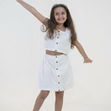 Mamarill Girls Classy Co-Ord Set In Crisp White, Elevated By Stylish Wooden Buttons On The Sleeveless Top.