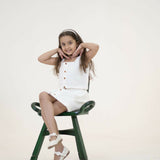 Mamarill Girls Classy Co-Ord Set In Crisp White, Elevated By Stylish Wooden Buttons On The Sleeveless Top.